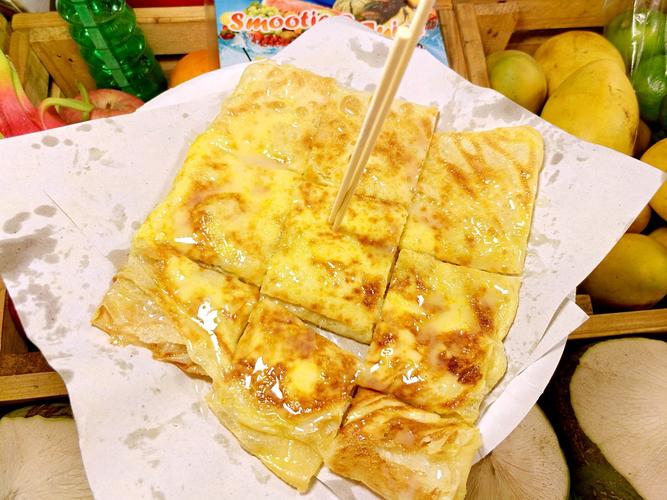 导读：泰国香蕉煎饼是一种招牌的早餐食品，给人们带来清香味，口感清脆